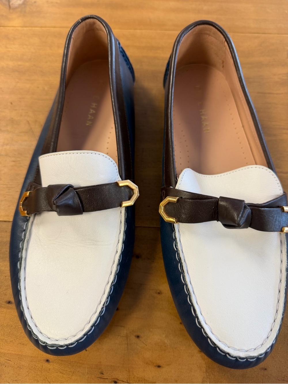 Cole Haan 3 Tone White and Navy Leather Loafers with Brown Knot & Gold Accents